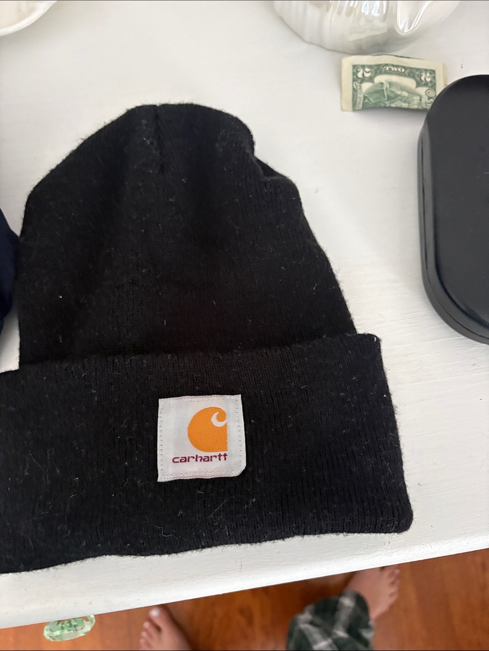 Carhartt Black Cuffed Beanie with Orange Logo Patch needs to be lint rolled lol